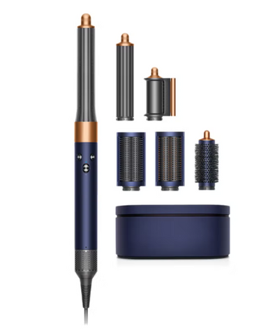 Navy blue hair styling tool with interchangeable attachments on a white background